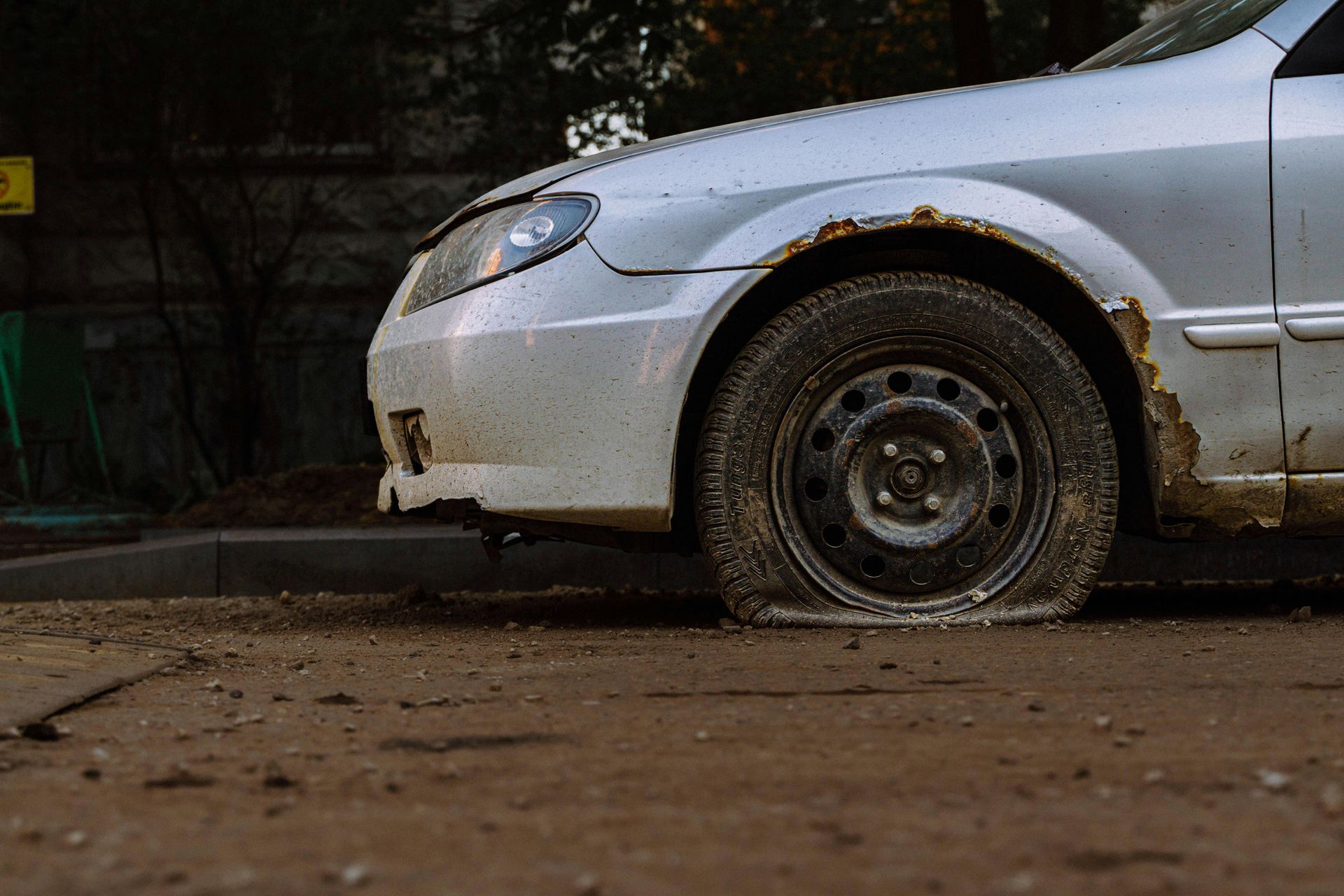A vehicle with a blown out tire