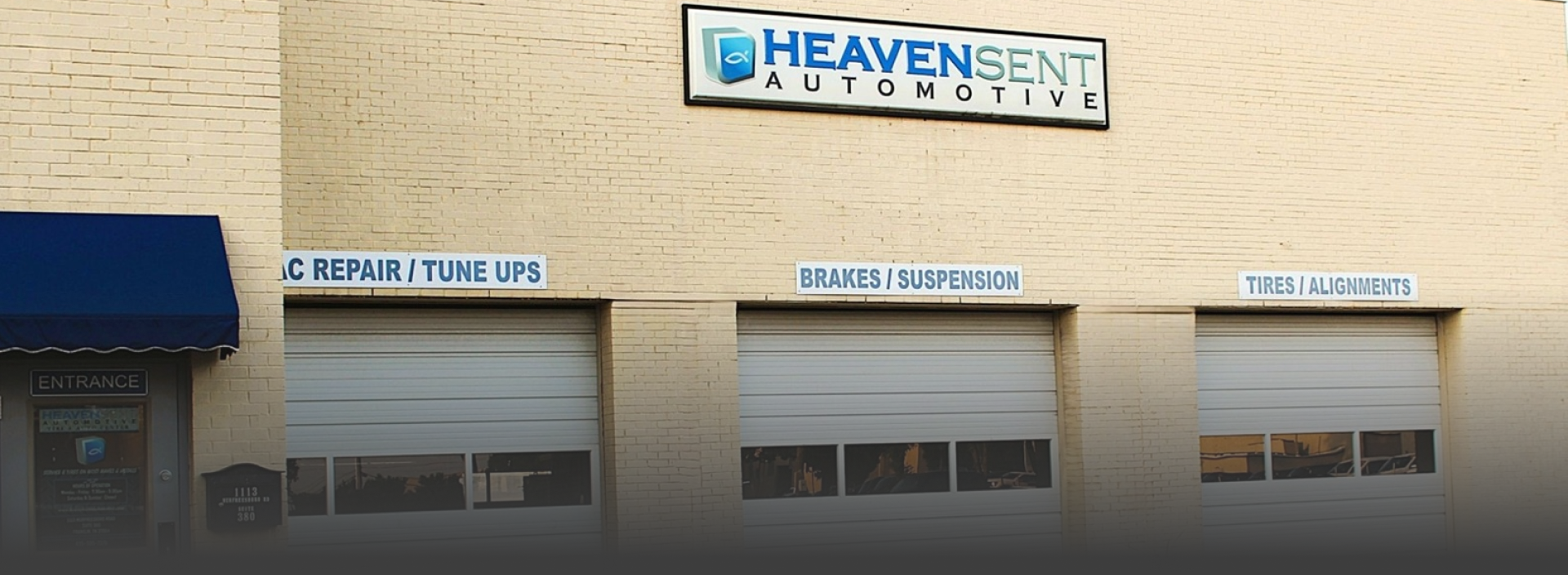 Heaven Sent Automotive shop front with three garage doors. | Heaven Sent Automotive