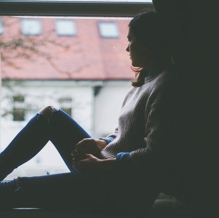 Woman Sitting — Plano, TX — North Texas Center for Pain Management