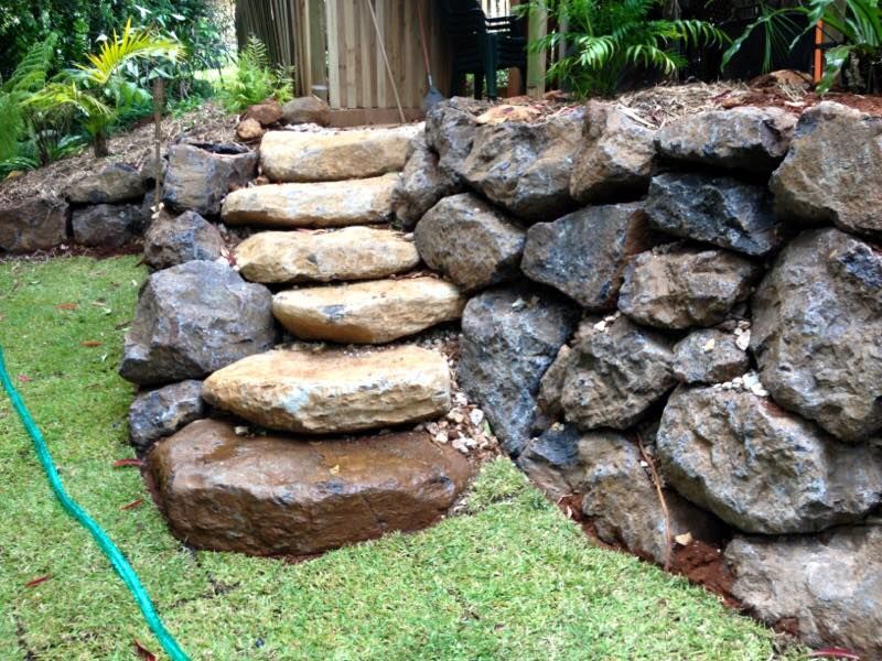 Stone Steps Built Into A Rock Wall In A Grassy Garden Yard — Border Rockwalls in Stotts Creek, NSW
