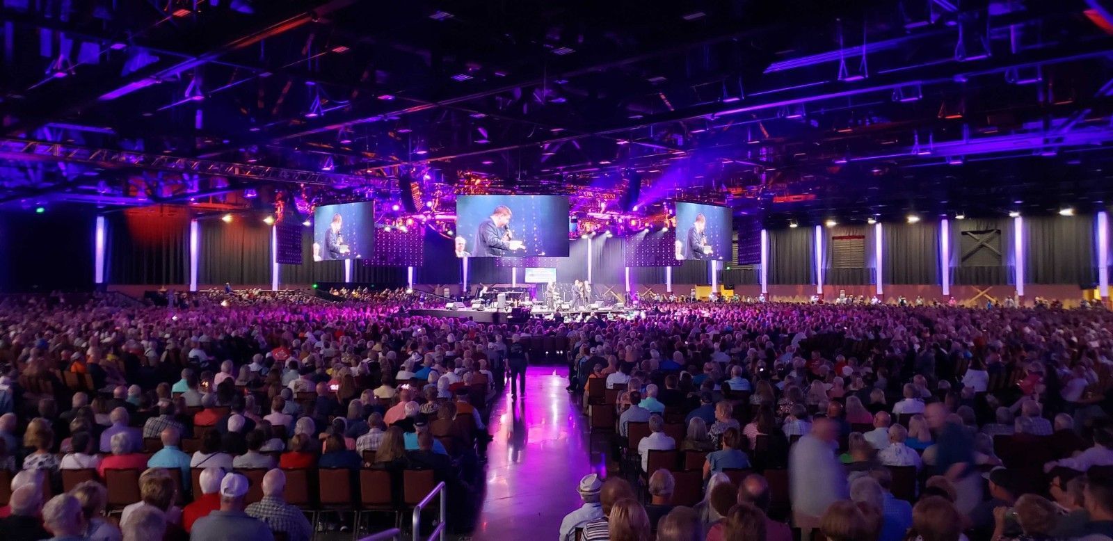 Attendees at a conference general session
