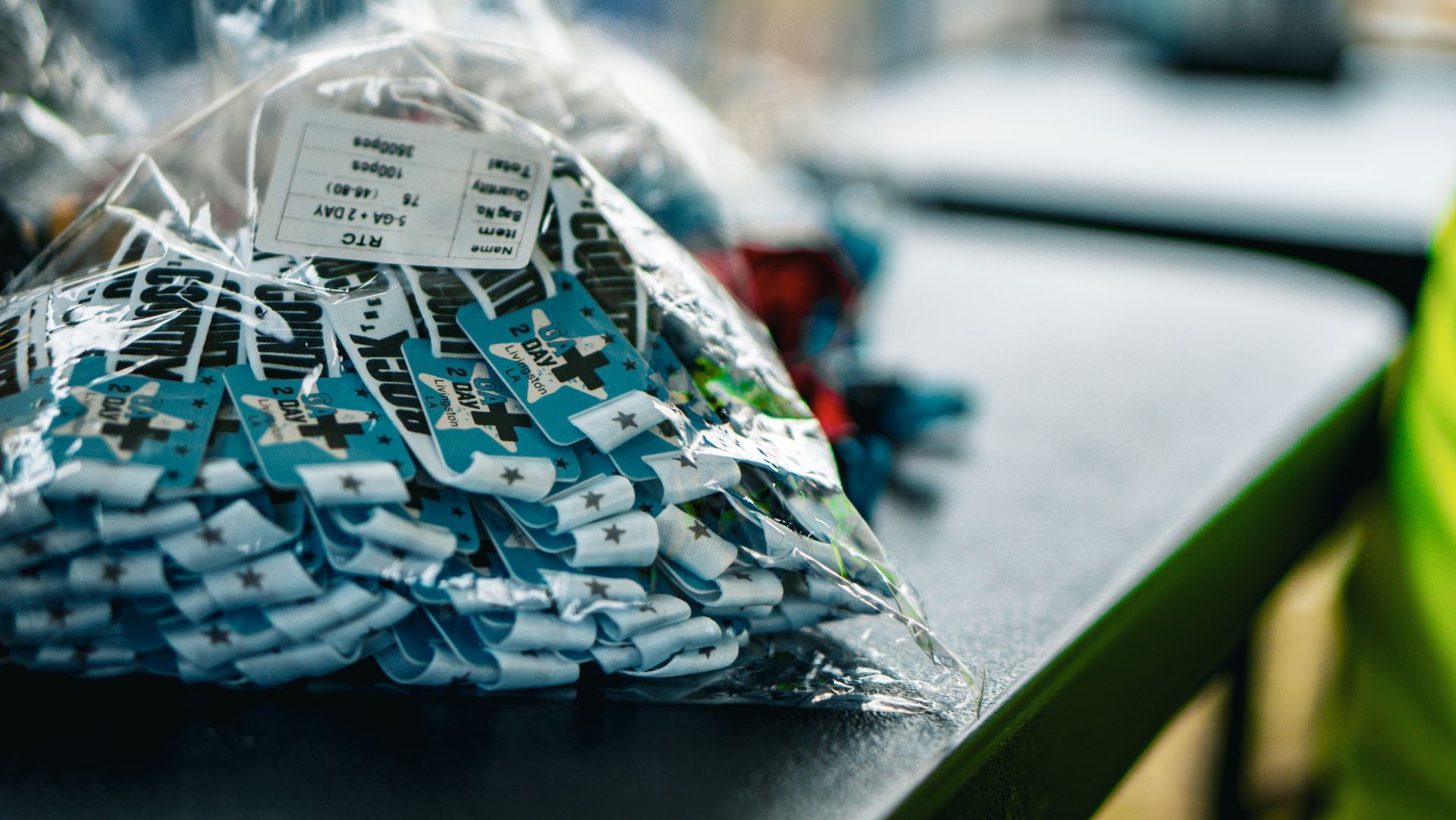 Two day general admission wristbands bagged and ready for a festival gate