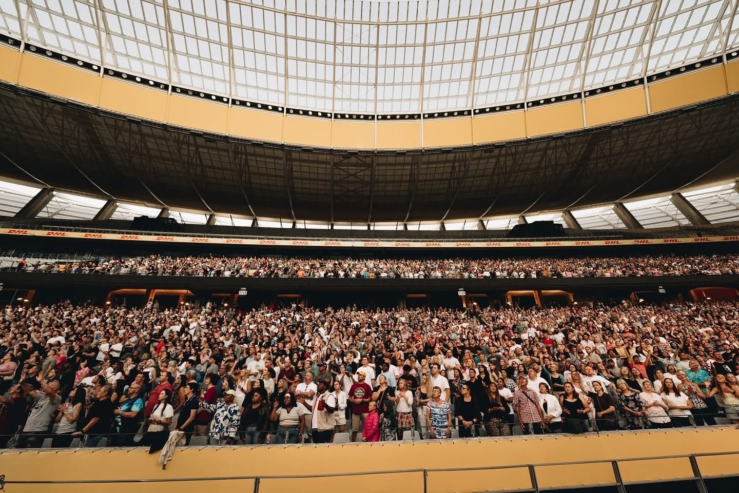 A full arena of reserved seats during a show