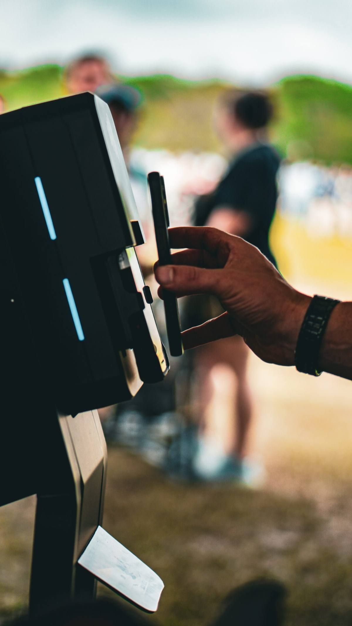 Ticket scanner in use at a venue entrance