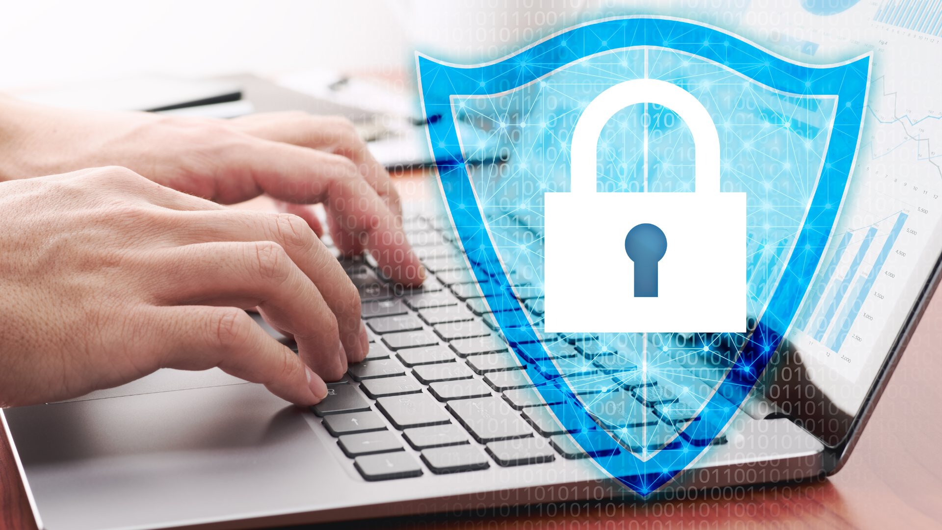 A person is typing on a laptop computer with a padlock on the screen.