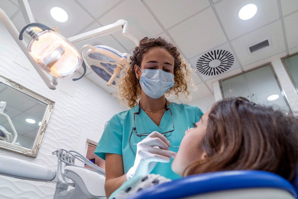 Dental Appointment Of A Girl — Lenoir, NC — Wayne Hollar DDS Dental Appointment Of A Girl — Lenoir, NC — Wayne Hollar DDS
