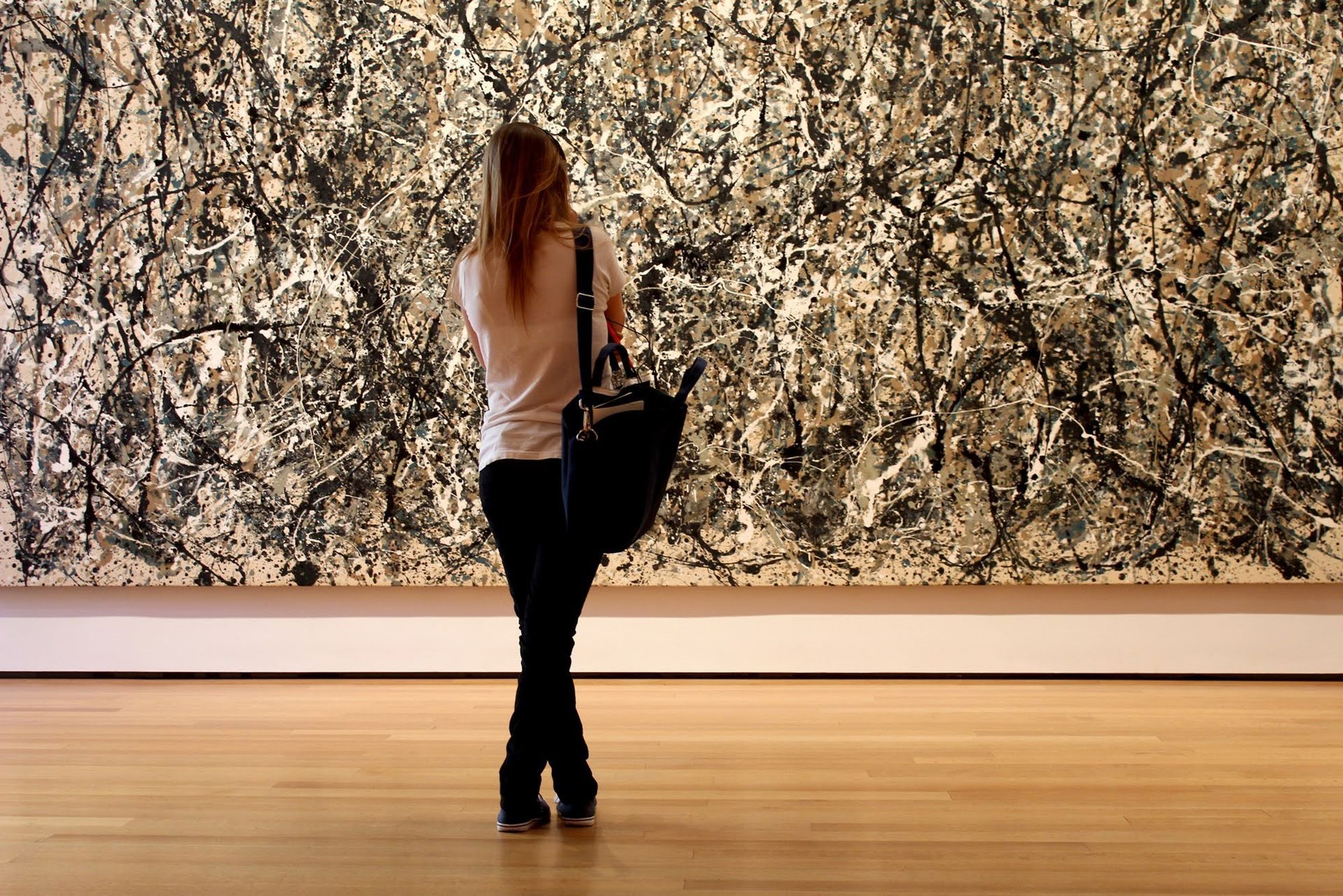 Woman Looking At The Painting - Atlanta, GA - Mathews Furniture + Design
