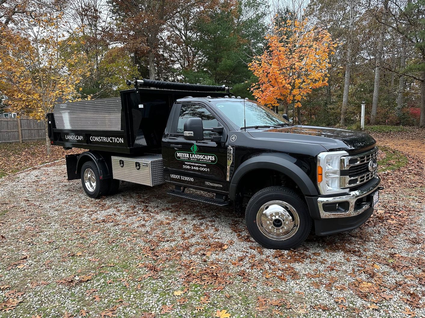 Company truck at a job site