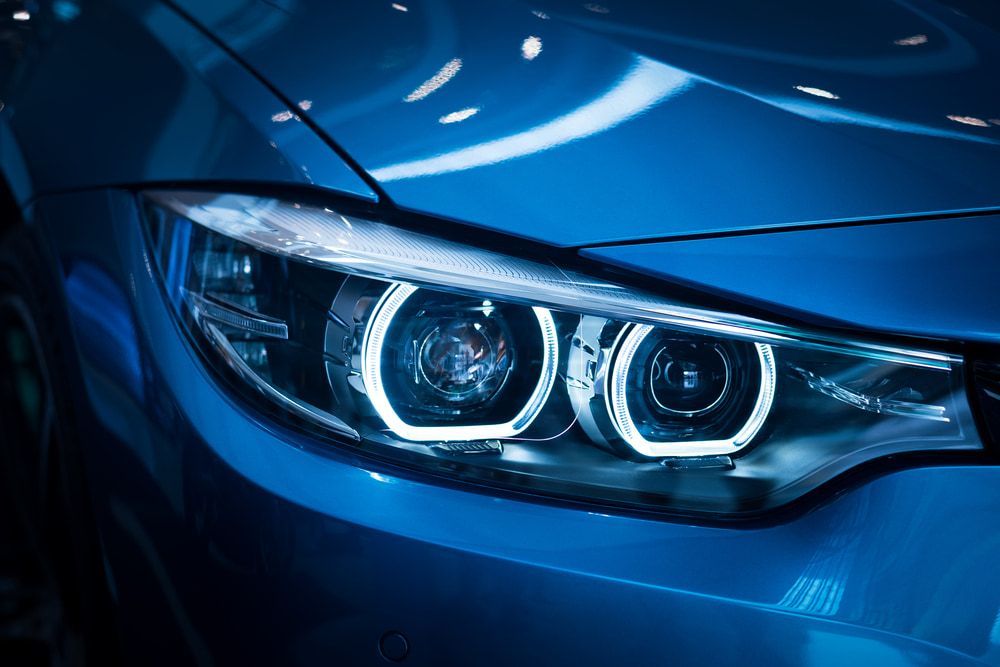 Headlights of a Blue Car — Norm Beatty's Auto Electrical Service In Forresters Beach, NSW