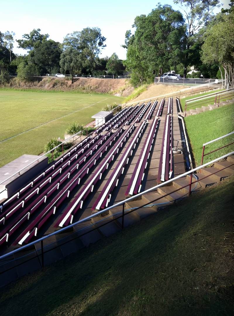 A Stadium With Rows Of Bleachers And A Field In The Background — EcoPro Pressure Cleaning In Yatala, QLD