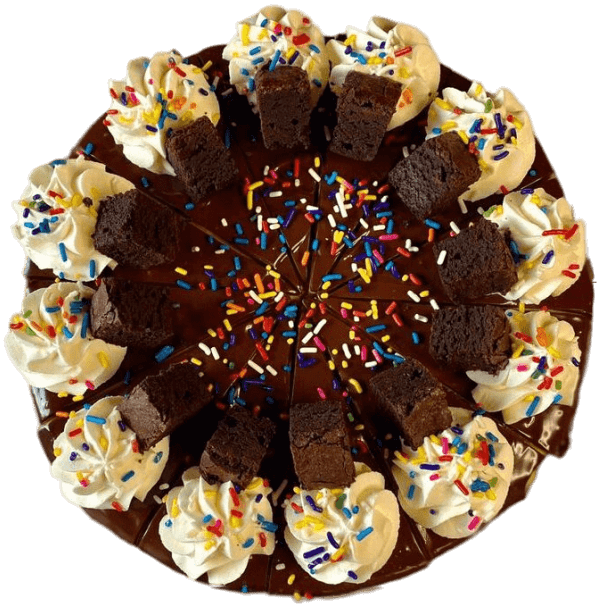 Chocolate cake topped with cream swirls, brownie pieces, and colorful sprinkles in a circle