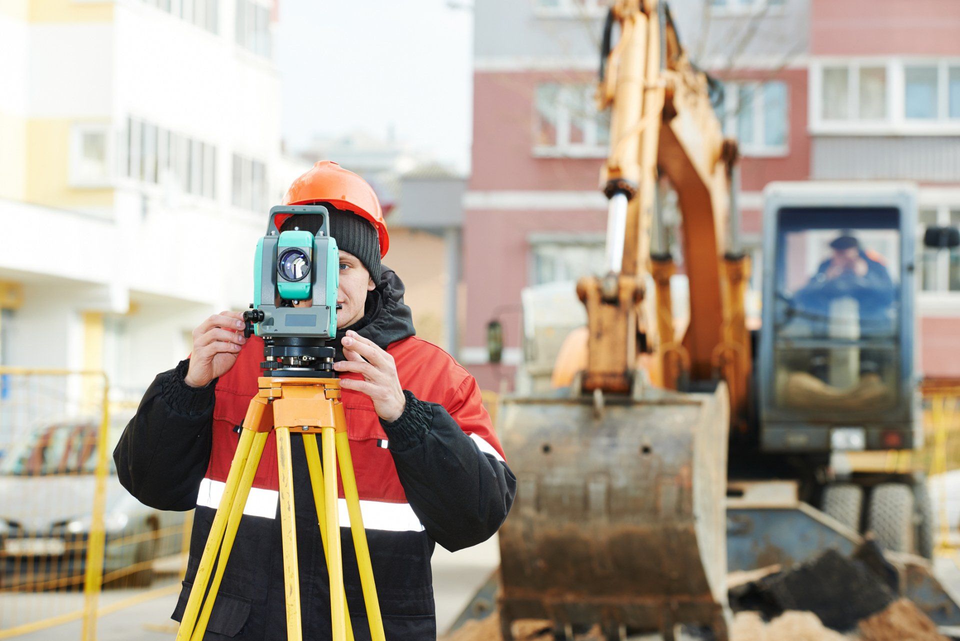 Worker Holding Theodolite — Spanish Fort, AL — Smith, Clark & Associates