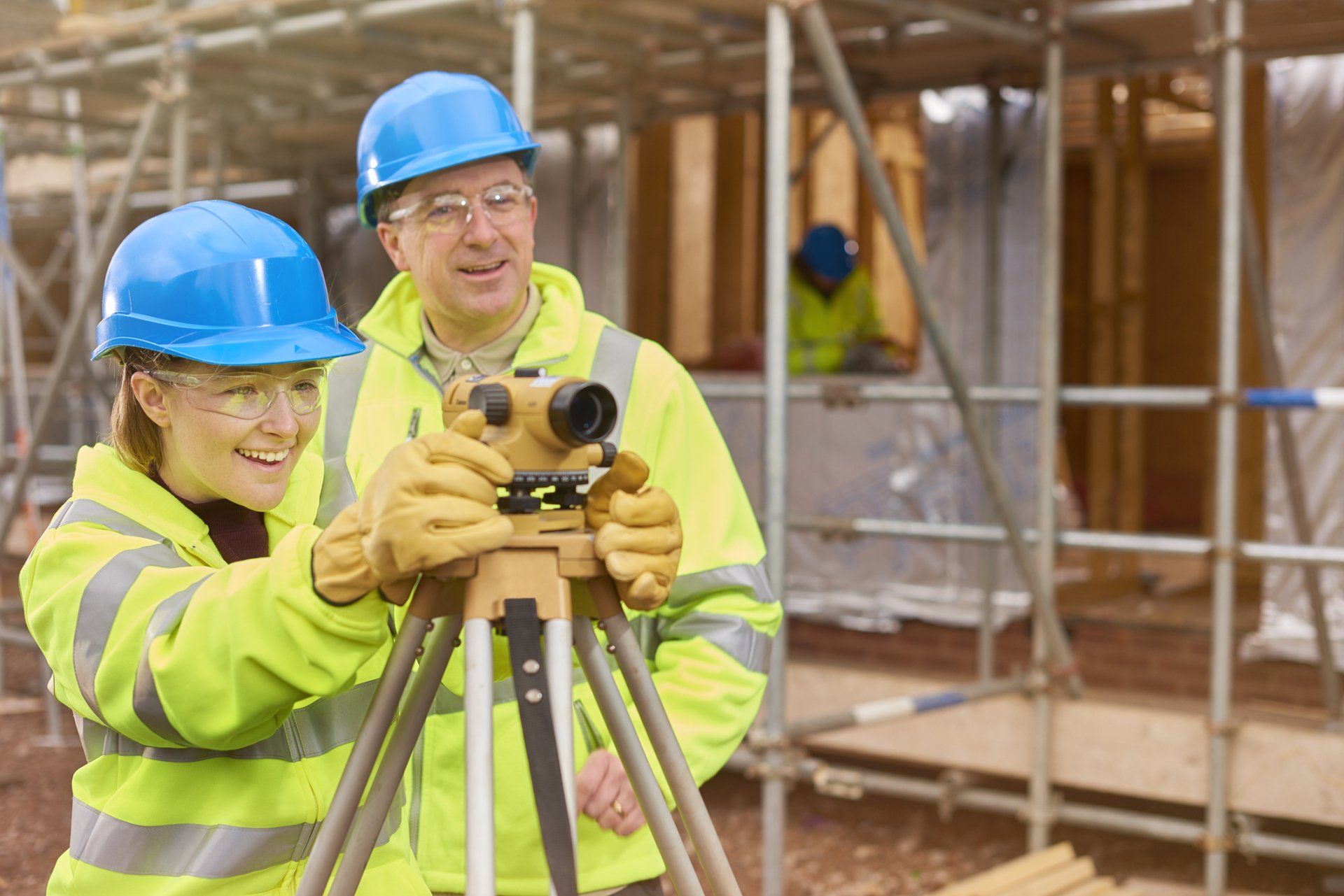 Two Workers with Theodolite — Spanish Fort, AL — Smith, Clark & Associates