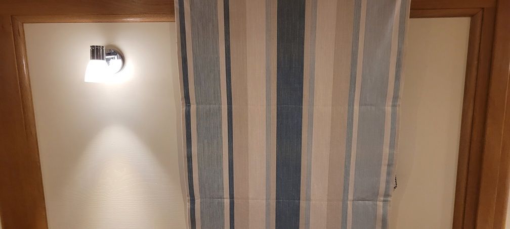 Roman blind down