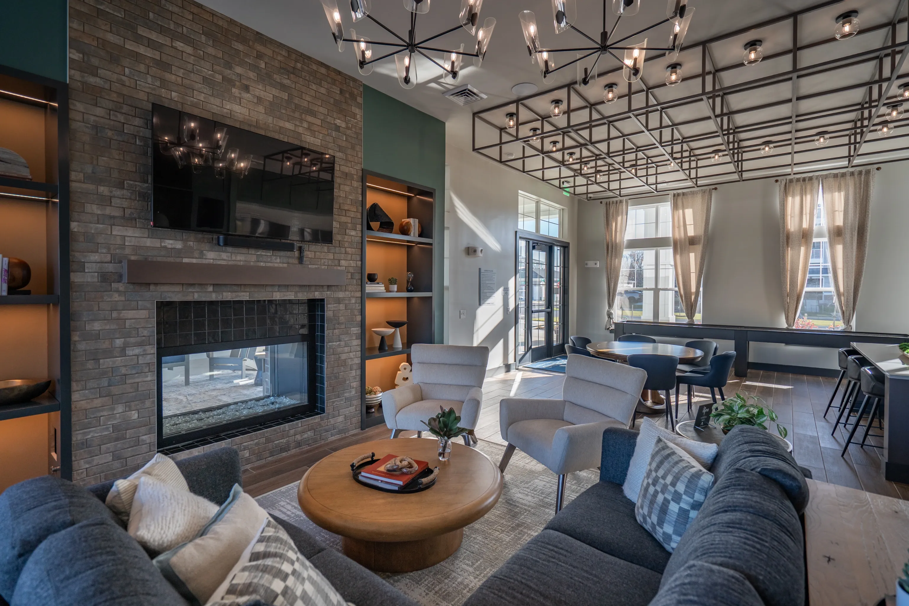 Modern lounge area with fireplace and seating