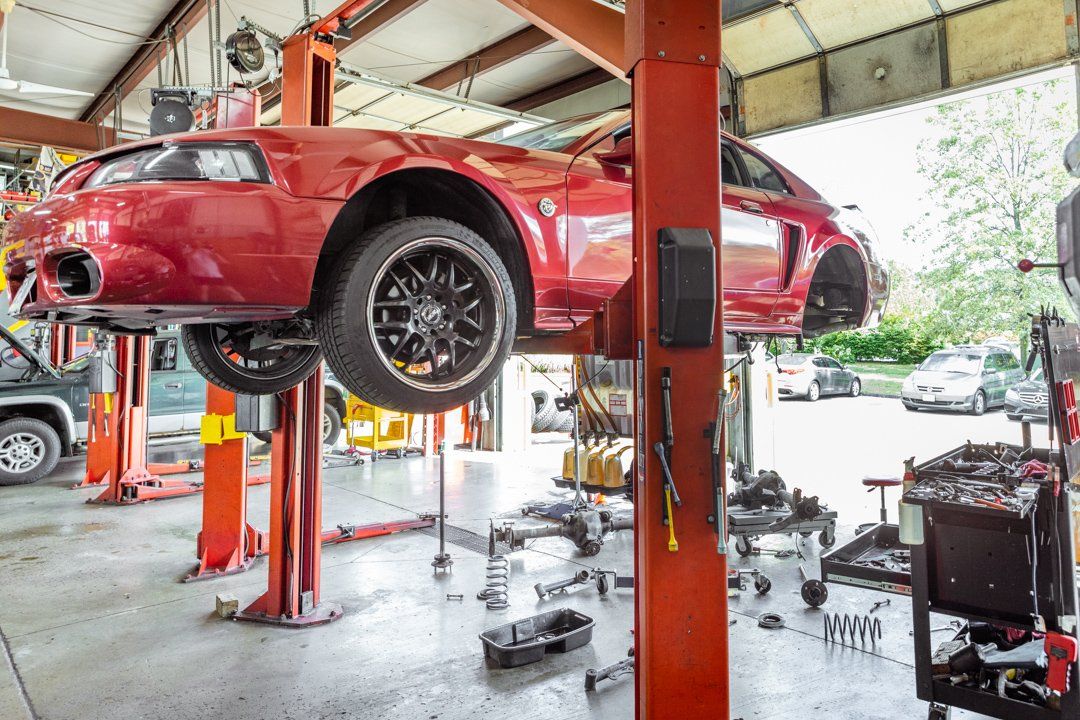 Coffey Automotive car on lift in St.Charles, MO at Coffey Automotive