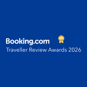 Booking.com Traveller Review Awards 2026 logo on a blue background with a gold medal icon