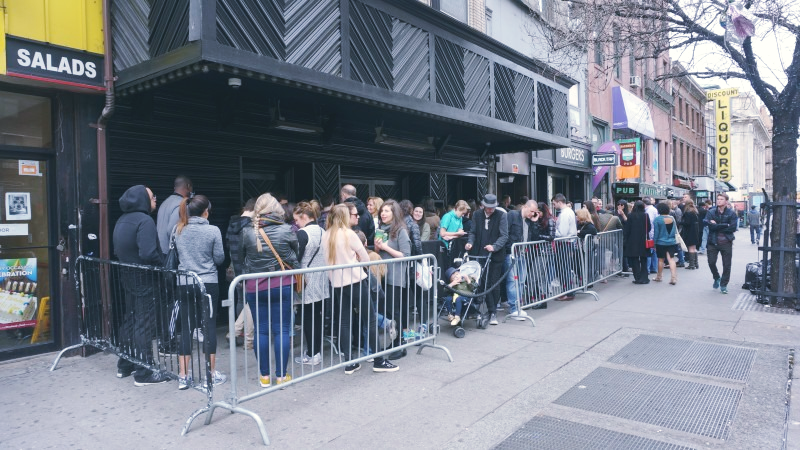People lined up outside a city venue