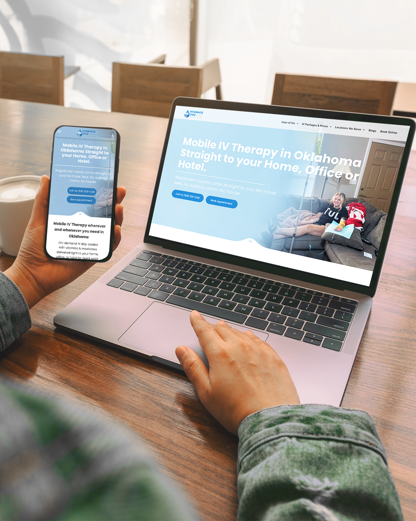 A laptop and a cell phone are displaying a website for mobile iv therapy in oklahoma.