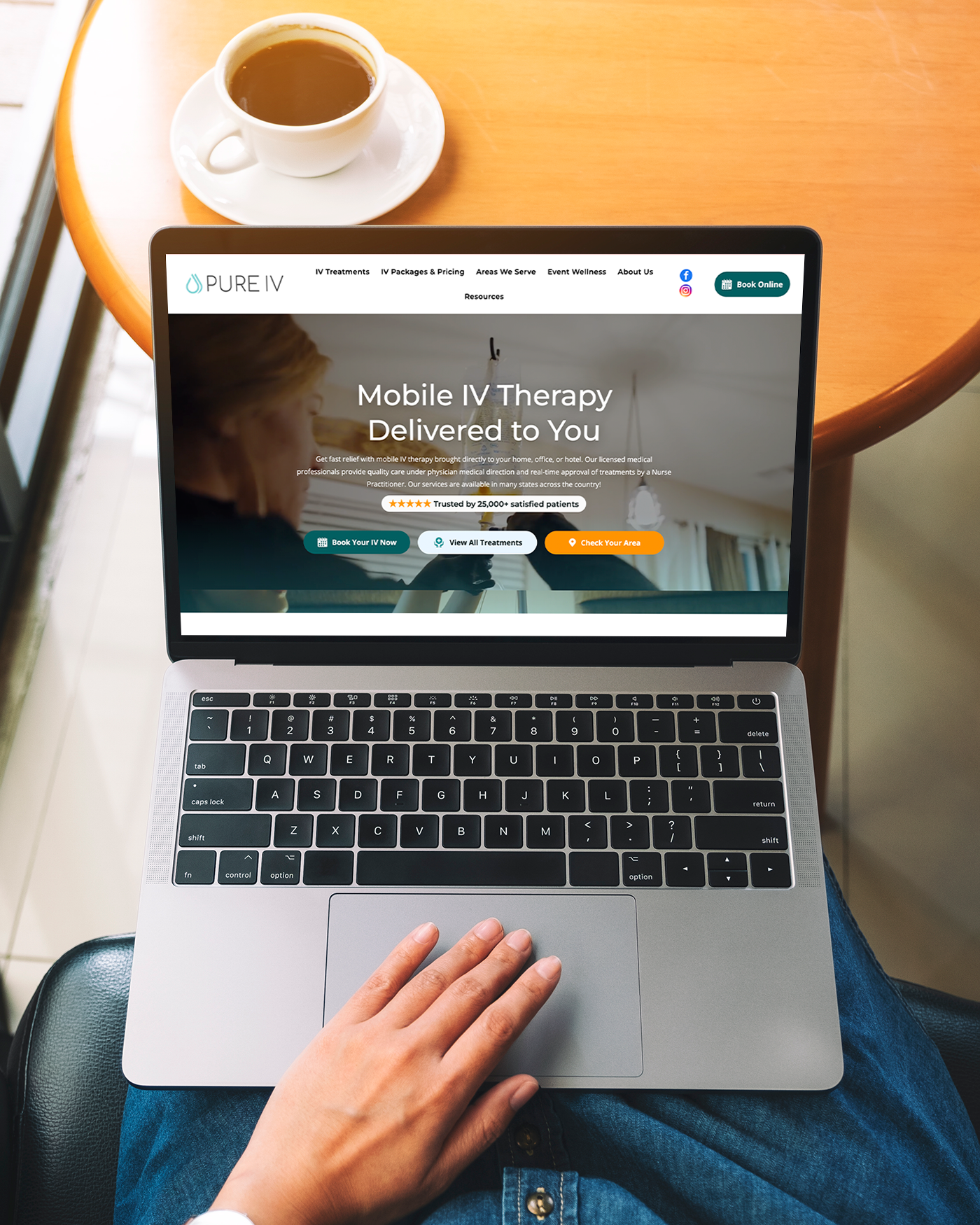 A laptop and a cell phone are displaying a website for mobile iv therapy in oklahoma.