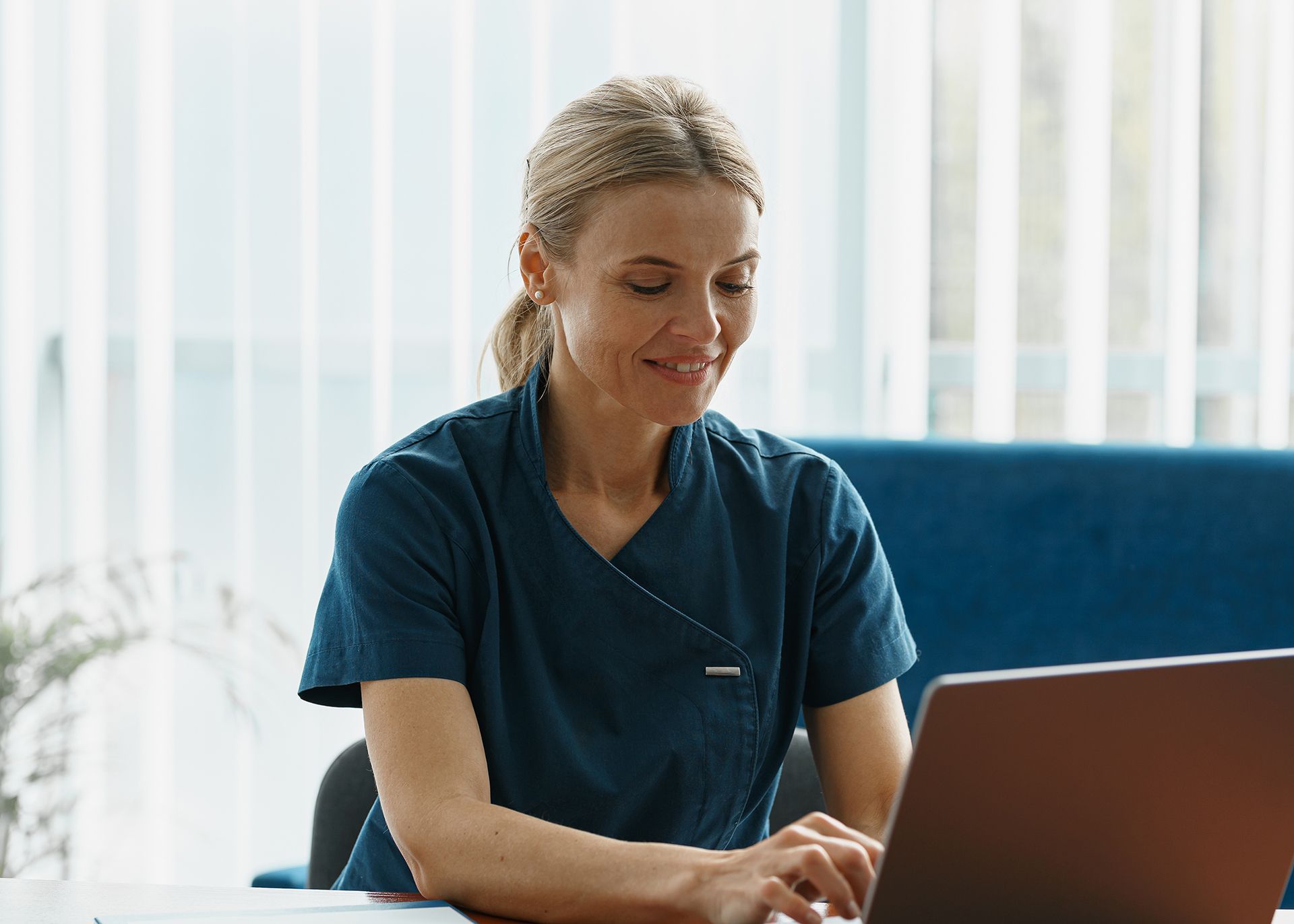 Nurse conducting virtual good faith exam