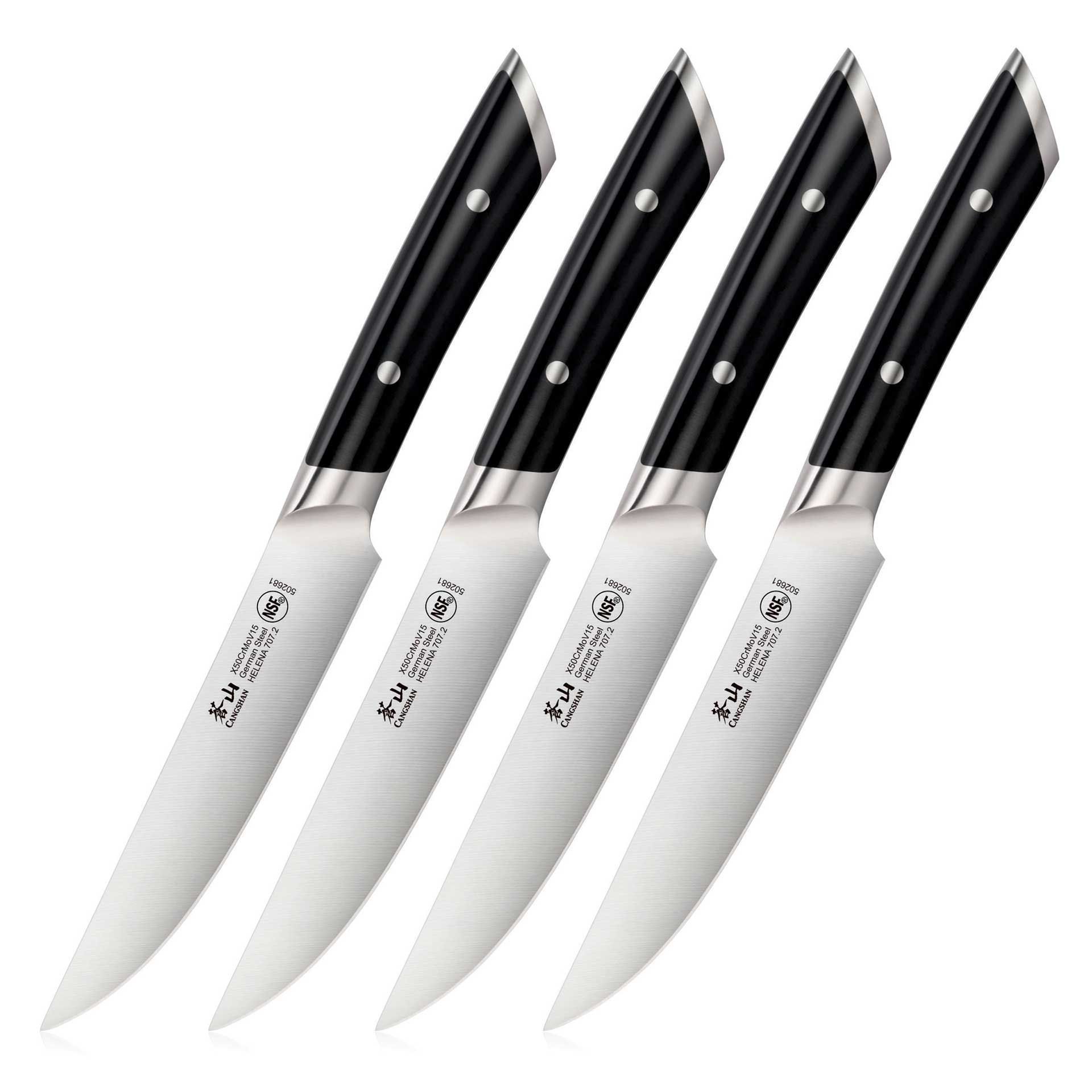 A set of four knives with chinese writing on them