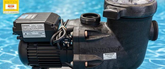 A Black Swimming Pool Pump is Sitting on Top of a Swimming Pool — Poolside Noosa in Noosaville, QLD
