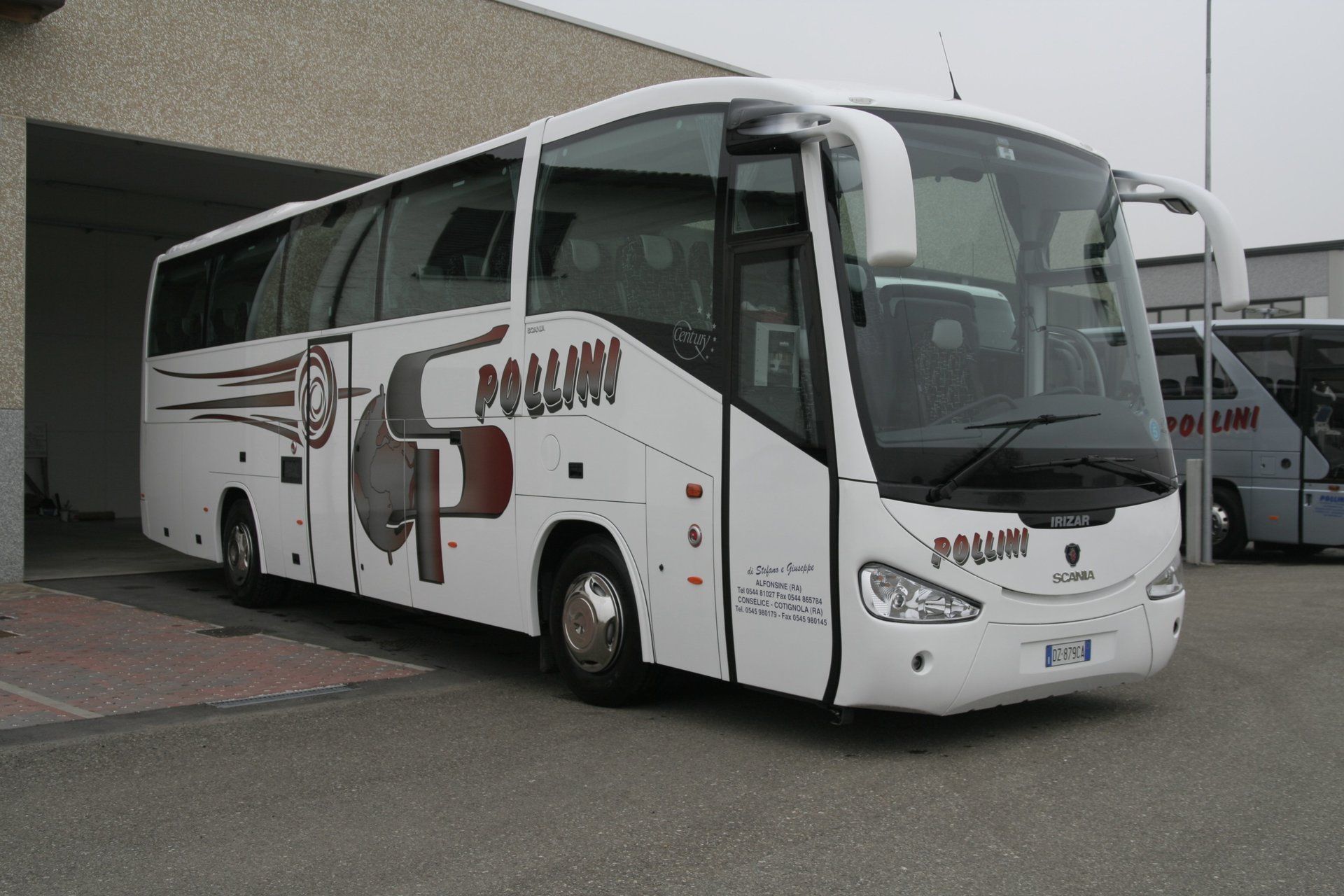 White coach with the word