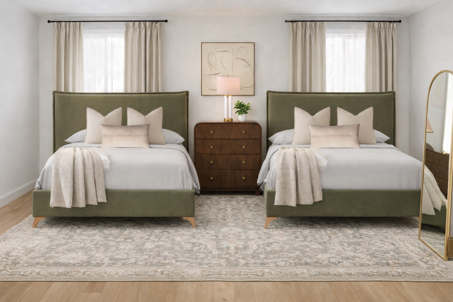 Two green twin beds in a bedroom, with a wooden dresser and a large rug.