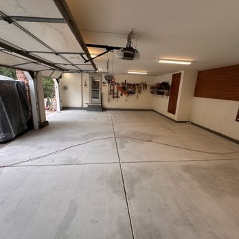 A garage floor before getting flake polyaspartic flooring in Valparaiso, IN by Resin Pros