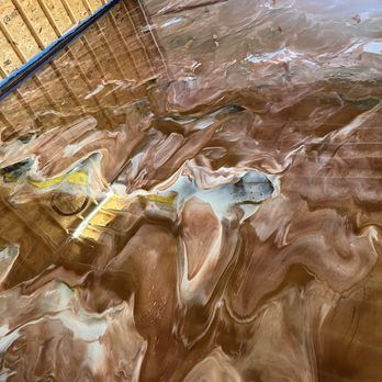 A metallic epoxy flooring in Valparaiso, IN by Resin Pros