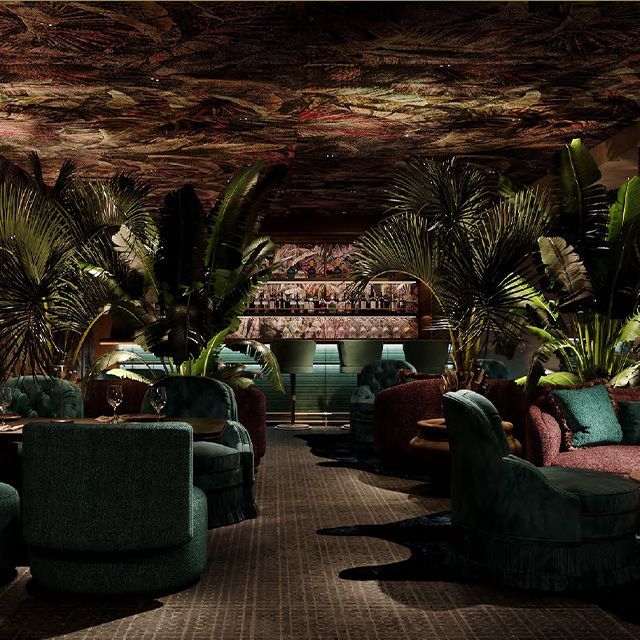 A large room with lots of furniture and plants