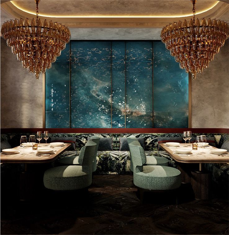 A private dining restaurant with two chandeliers hanging from the ceiling at the Harbour Club in Miami Beach.