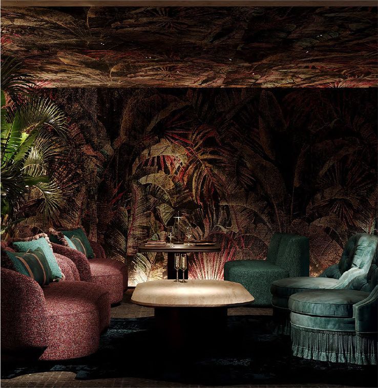 A private lounge area at the Harbour Club in Miami Beach showing cushioned chairs and  cocktail tables.