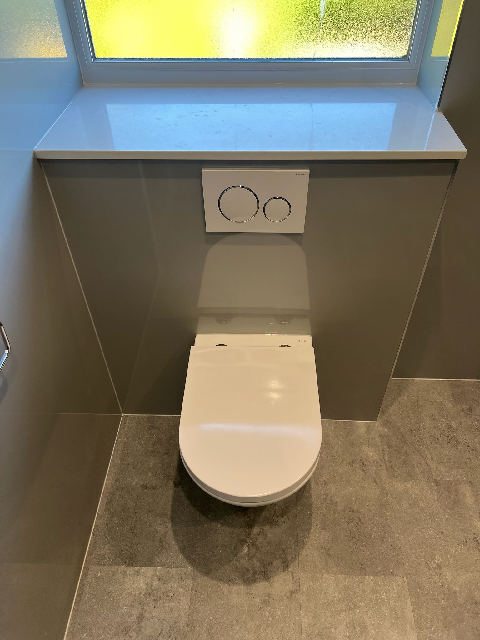 Bathroom installation in Tilehurst with concealed toilet fitted by local bathroom fitters
