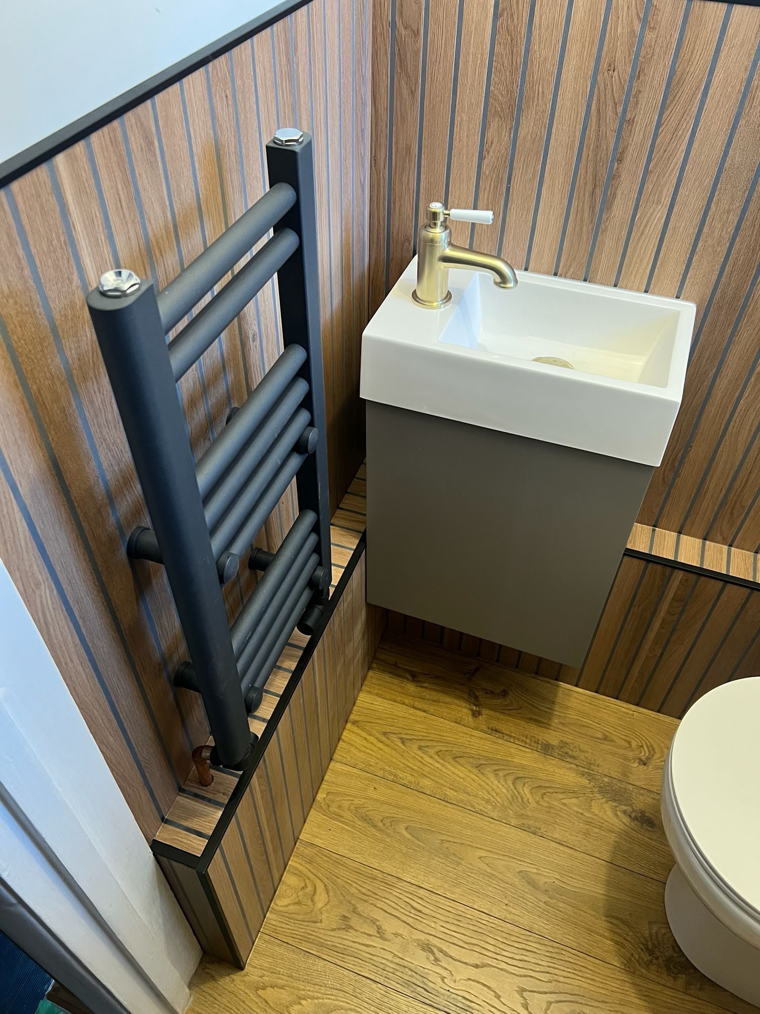 downstairs wc with floating vanity fitted in reading