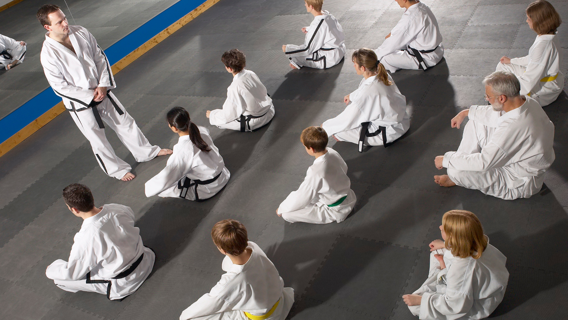 Martial arts academy students participating in structured martial arts training programs with professional instructors