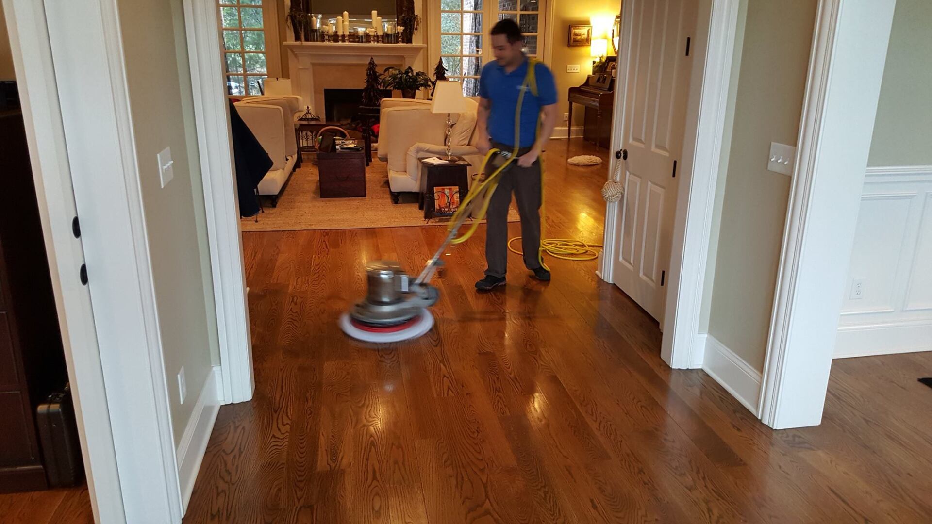 Worker cleaning hardwood — Murfreesboro, TN — Drycon of Middle Tennessee