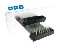 Flat ribbon cable connector, black plastic housing with metal pins, gray cable.