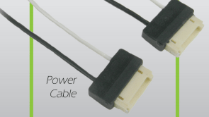 Two black and white SATA power cables with beige connectors.