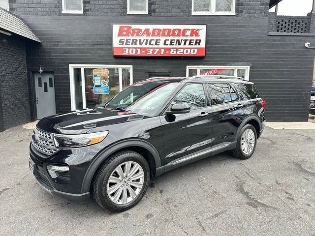 Black SUV parked outside Braddock Service Center building | Braddock Motors Service