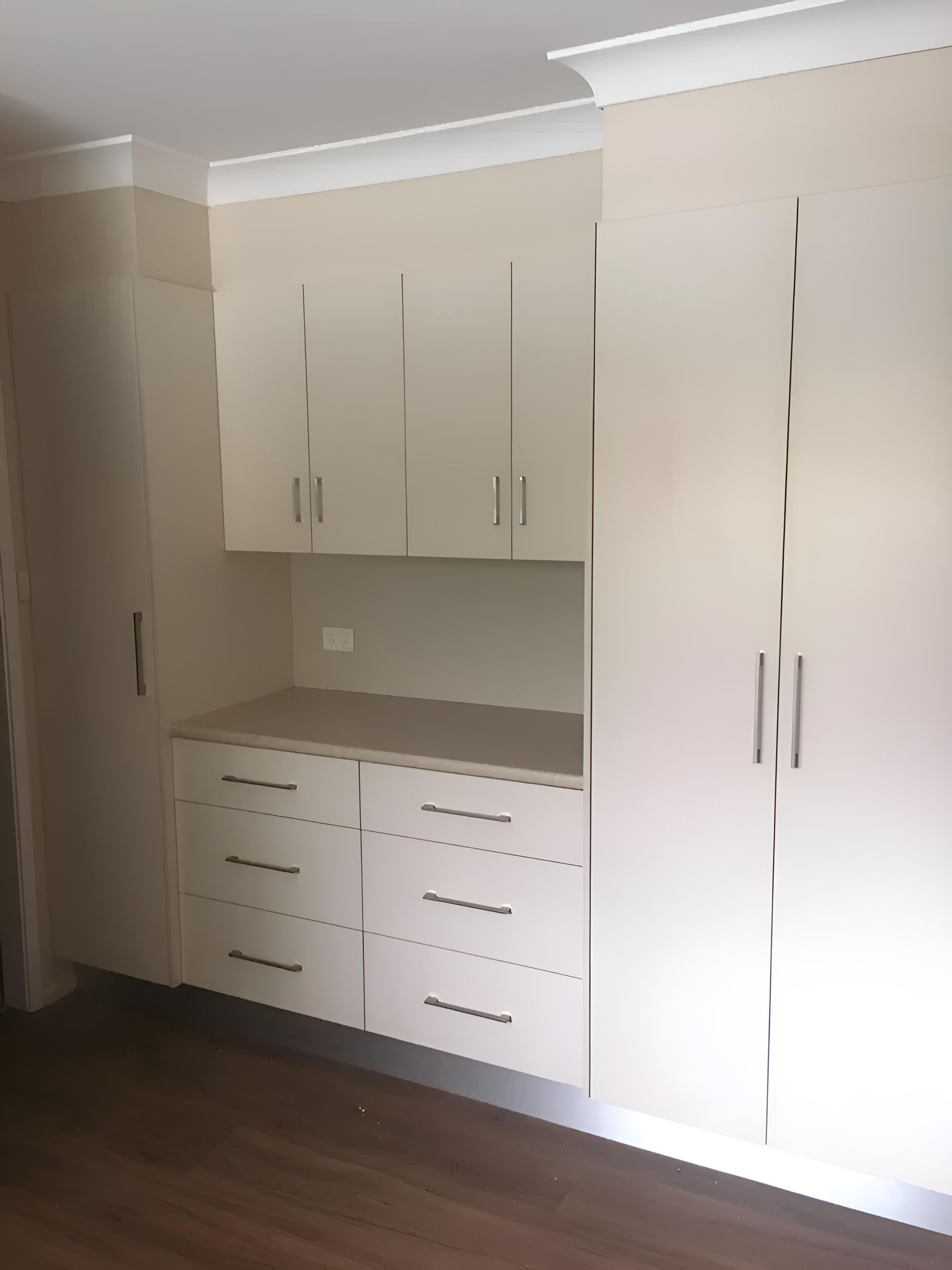 A Room With A Lot Of White Cabinets And Drawers — Hey Presto Kitchens & Renovations in Uralla, NSW