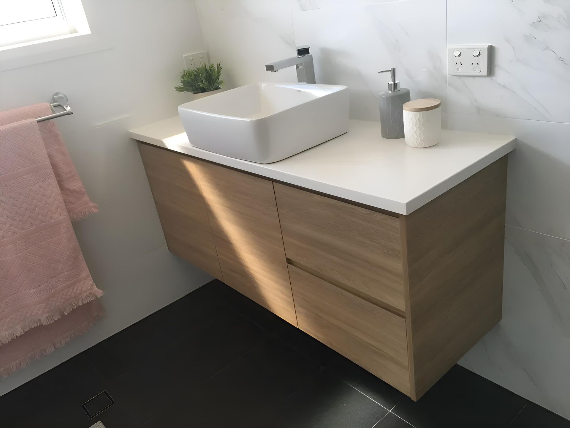 A Bathroom With A Sink And A Towel Rack — Hey Presto Kitchens & Renovations in Armidale, NSW
