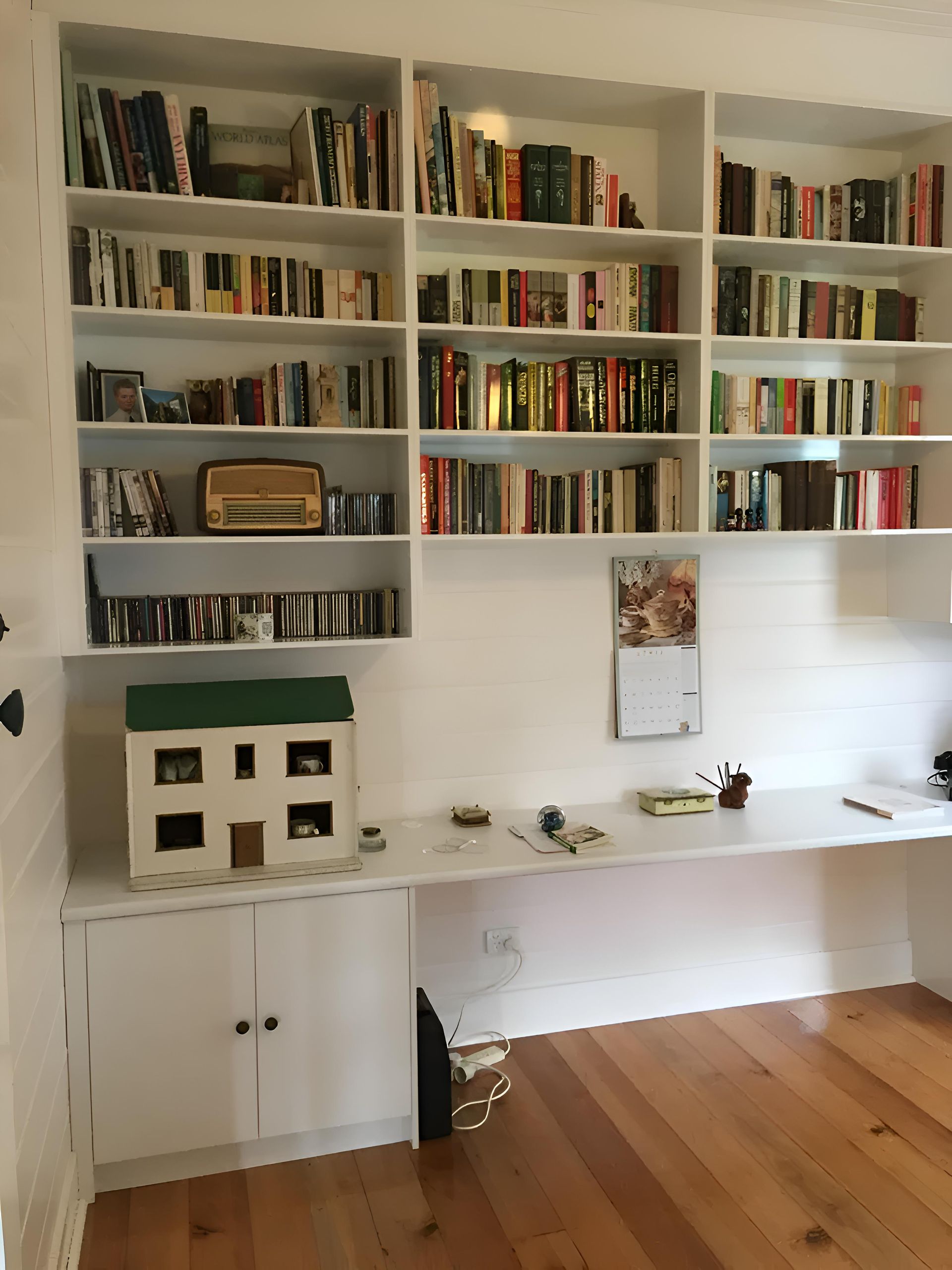 A study room with lots of books on the shelves — Hey Presto Kitchens & Renovations in Armidale, NSW