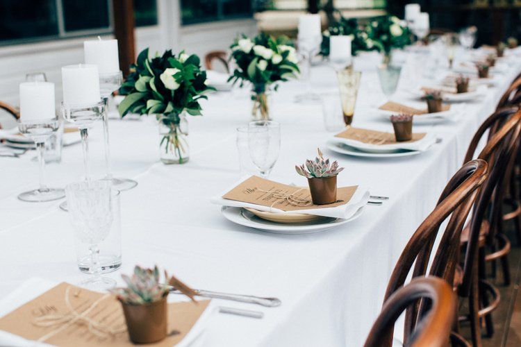 Plates And Utensils On A Table With Plants — Wedding & Event Hire In Goonellabah, NSW