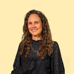 Product Owner Bay McGovern smiling at camera