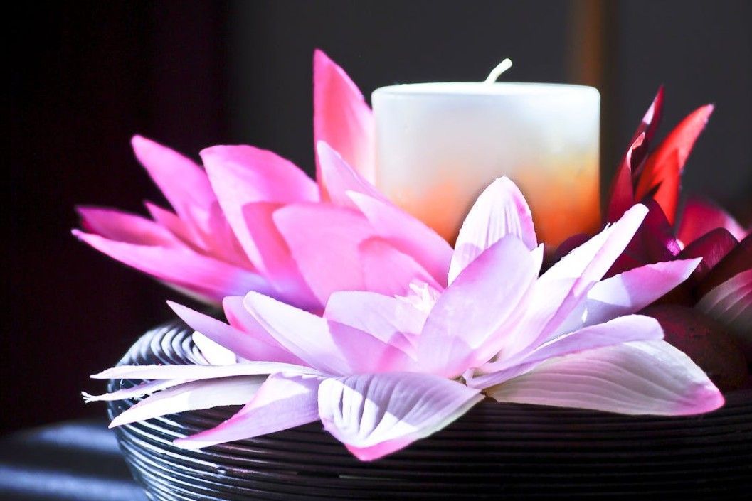 Memorial candles and flowers symbolizing compassionate funeral and cremation care in Mount Pleasant, TN