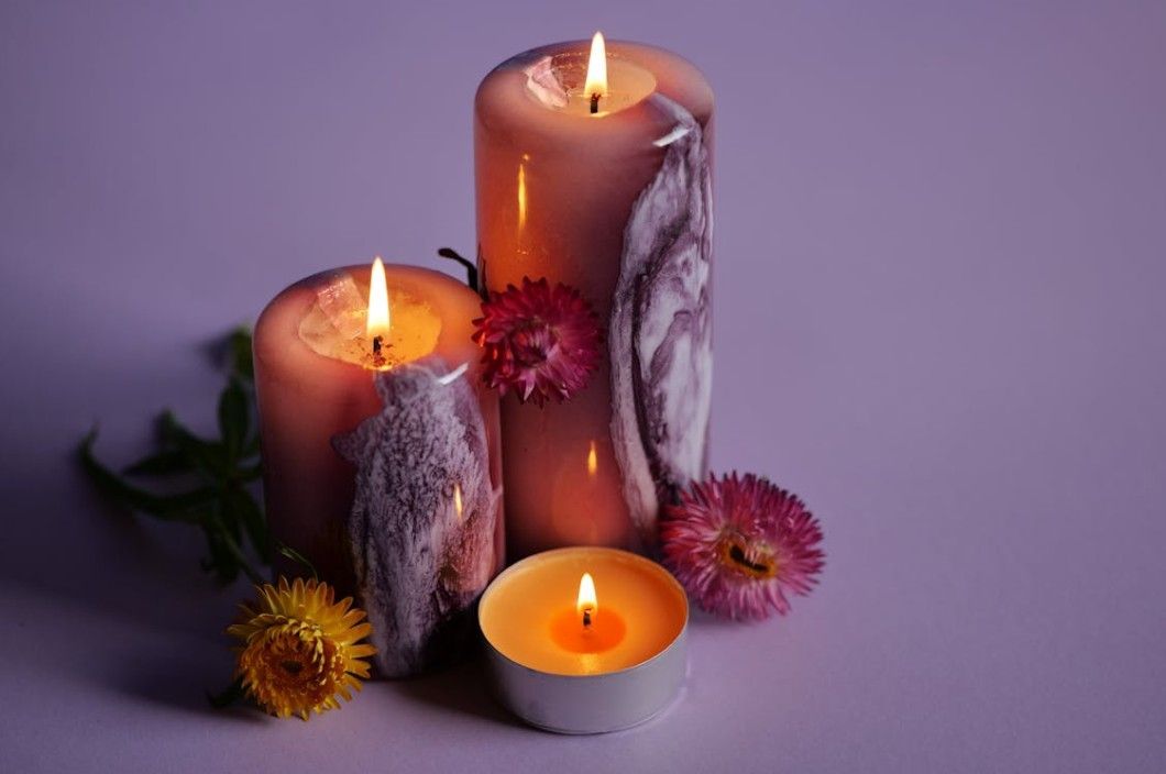 Memorial candles and flowers symbolizing compassionate funeral and cremation care in Mount Pleasant, TN