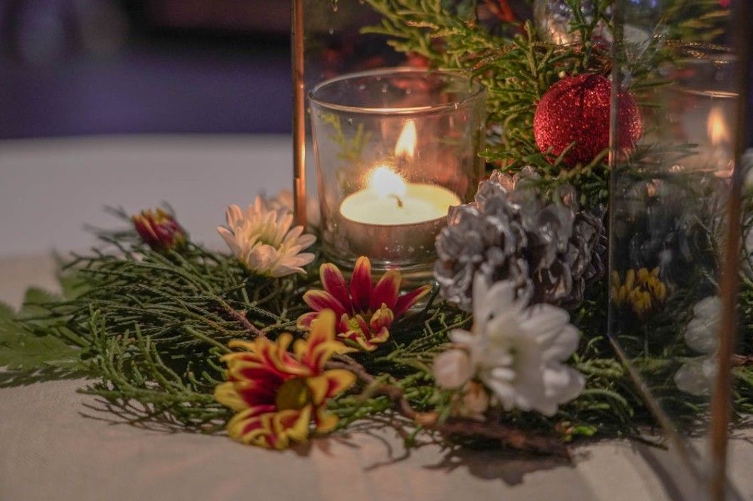 Candlelit floral memorial arrangement for compassionate funeral and cremation services in Spring Hill, TN