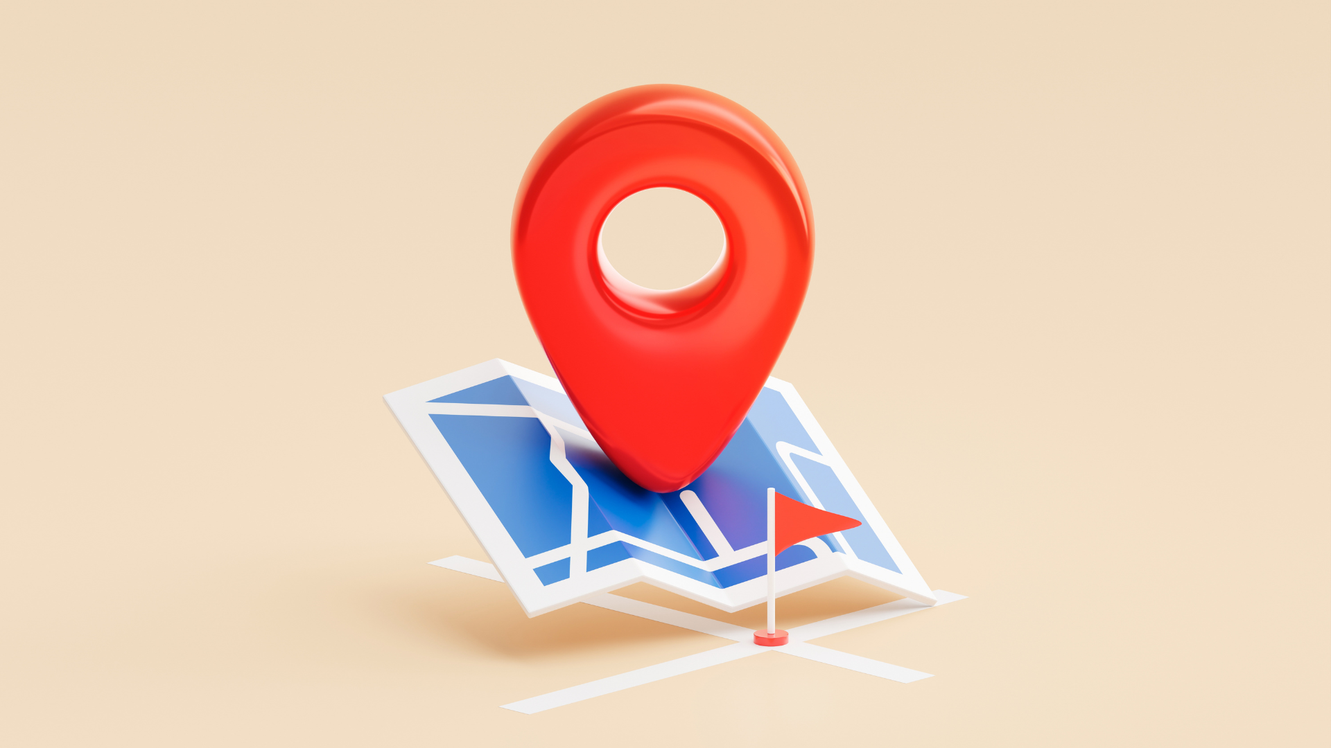 A large 3D red location pin resting on a folded blue and white stylized map with a small red flag marker.